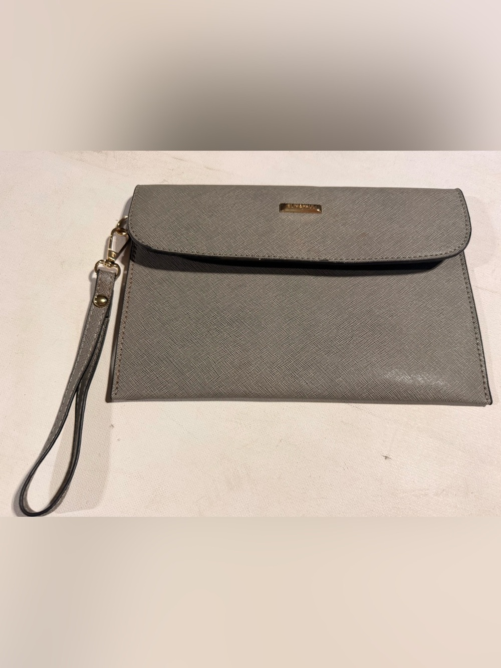 Elegant Gray Wristlet Clutch with Gold Trim by Elim & Paul